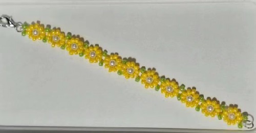 7月13日，靠譜手工兼職平臺(tái)，在家兼職正規(guī)的日結(jié)手工有沒(méi)有，開(kāi)手工加工廠，與手工之家合作，這幾點(diǎn)做得好，收入自然就好，圖為串珠米珠繡純手工產(chǎn)品剪影